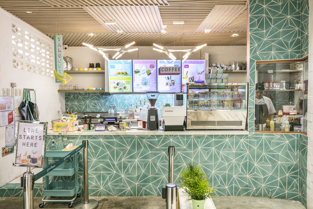 The Lost Bread counter is clad in turquoise panels