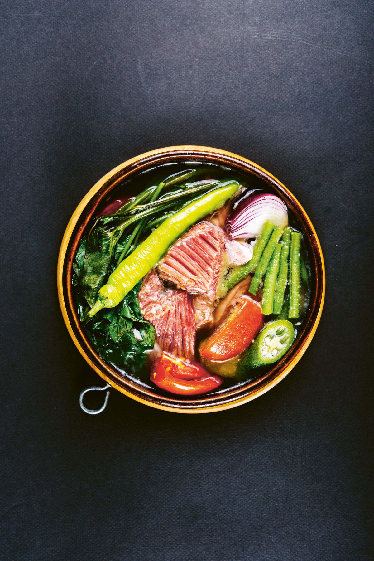 One of Filipino cuisine's signature dishes is the sour and versatile sinigang