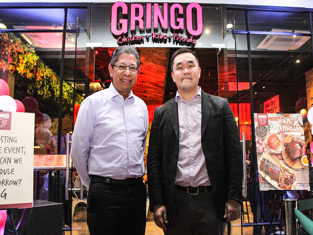 President and CEO of Ortigas & Co. Jaime Ysmael and Reagan Tan at the Gringo San Juan opening
