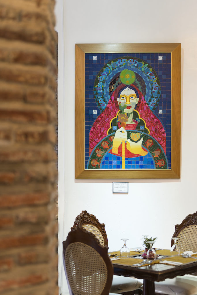 Saint Owwa by Perfecto Baloloy hangs in the Comedor restaurant of Hotel Luna