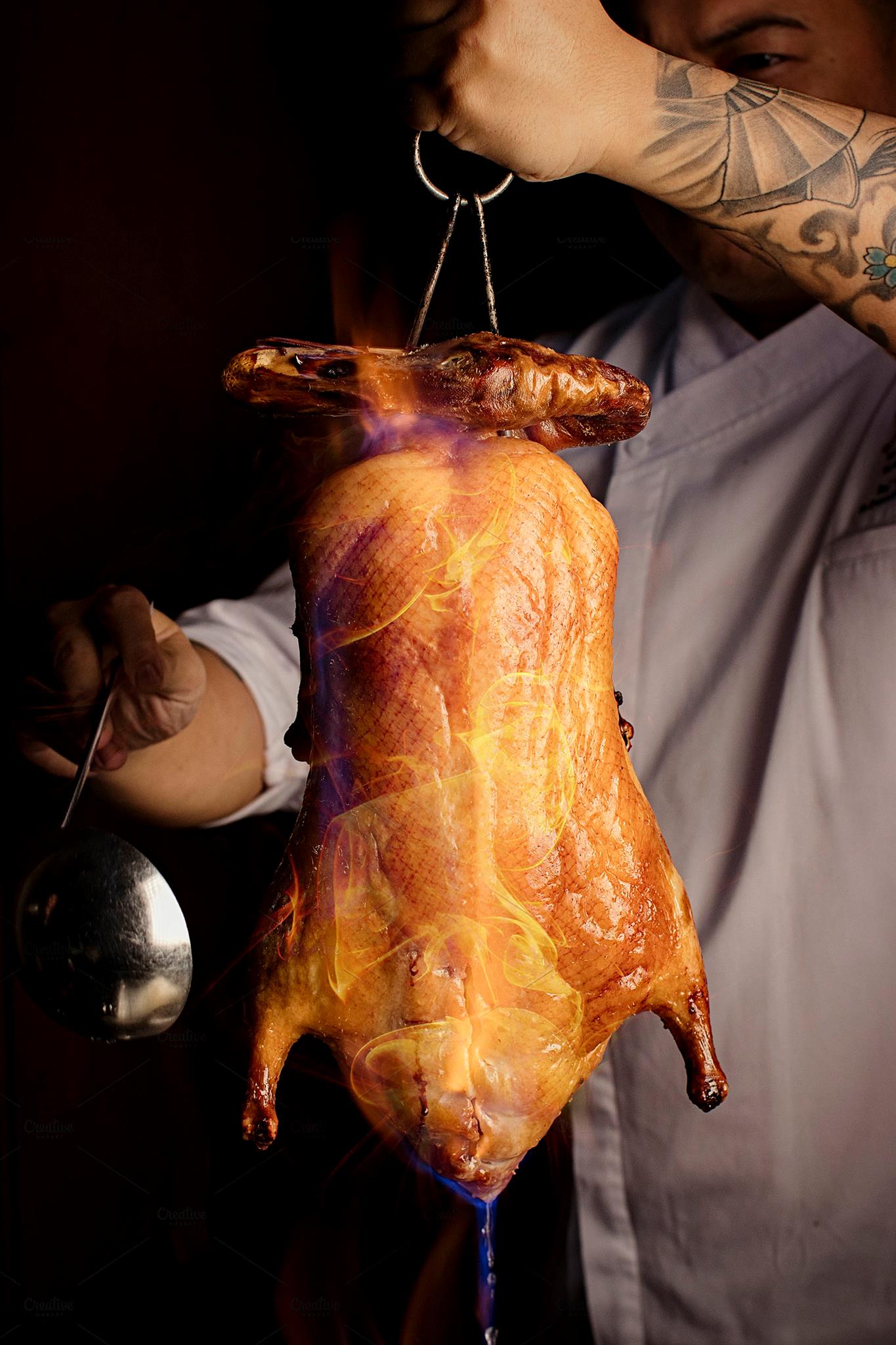 Roasted flambéed peking duck is a signature Cantonese cuisine staple