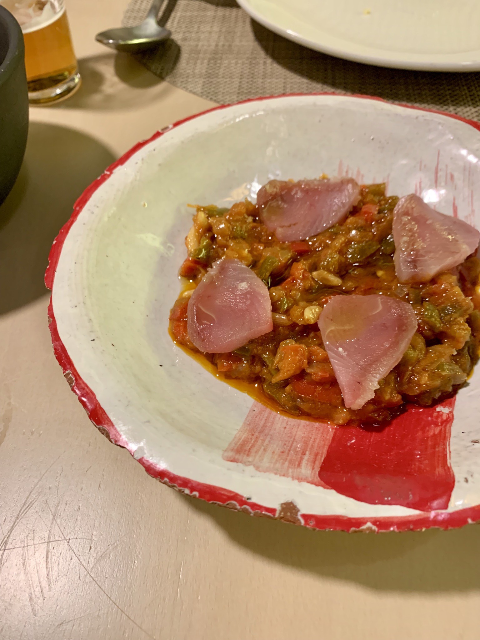 Titaina from Vicente Patiño's Sucar is a traditional dish from the El Cabañal district made with tomatoes and pinñones