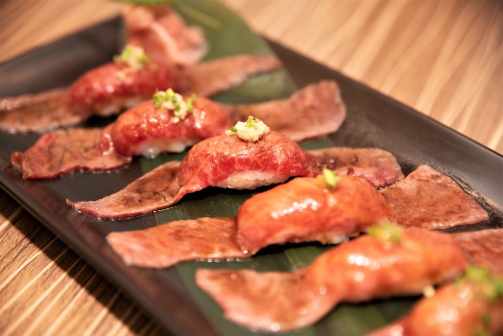 Torched Miyazaki wagyu beef over Japanese sushi rice