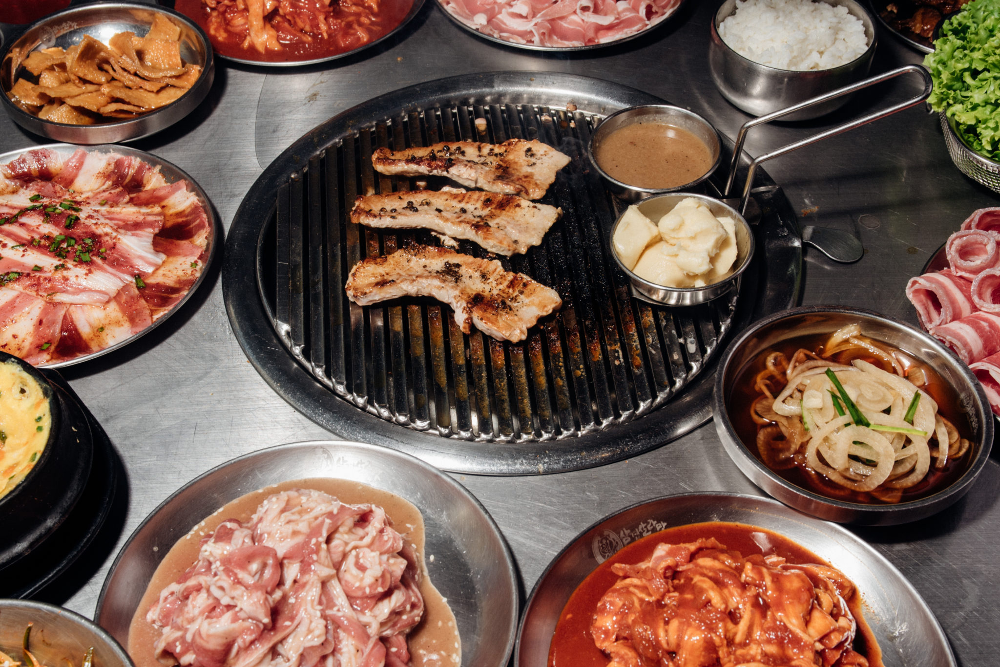 Give the unlimited Korean barbecue customer reasons to return—like new products, from cuts of meat to sides, and reliable service