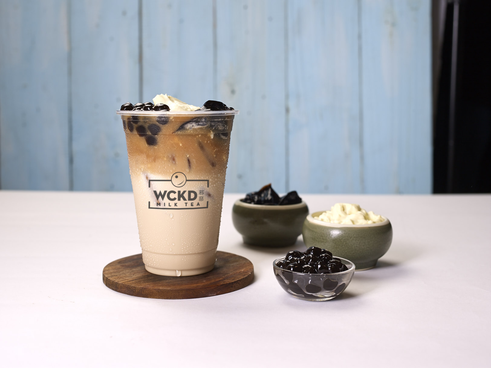 Wckd's "Ulteamate" beverage is flavored with fresh tea leaves and topped with tapioca pearls, grass jelly, and pudding