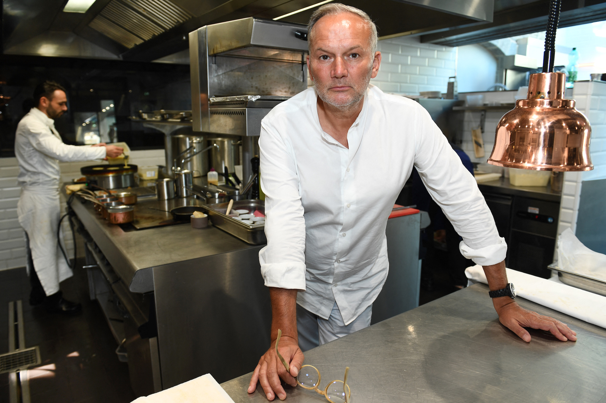 French three-star Michelin chef Christian Le Squer poses at the kitchen of the Moulin de Rosmadec's restaurant in Pont-Aven, Western France, on July 29, 2020