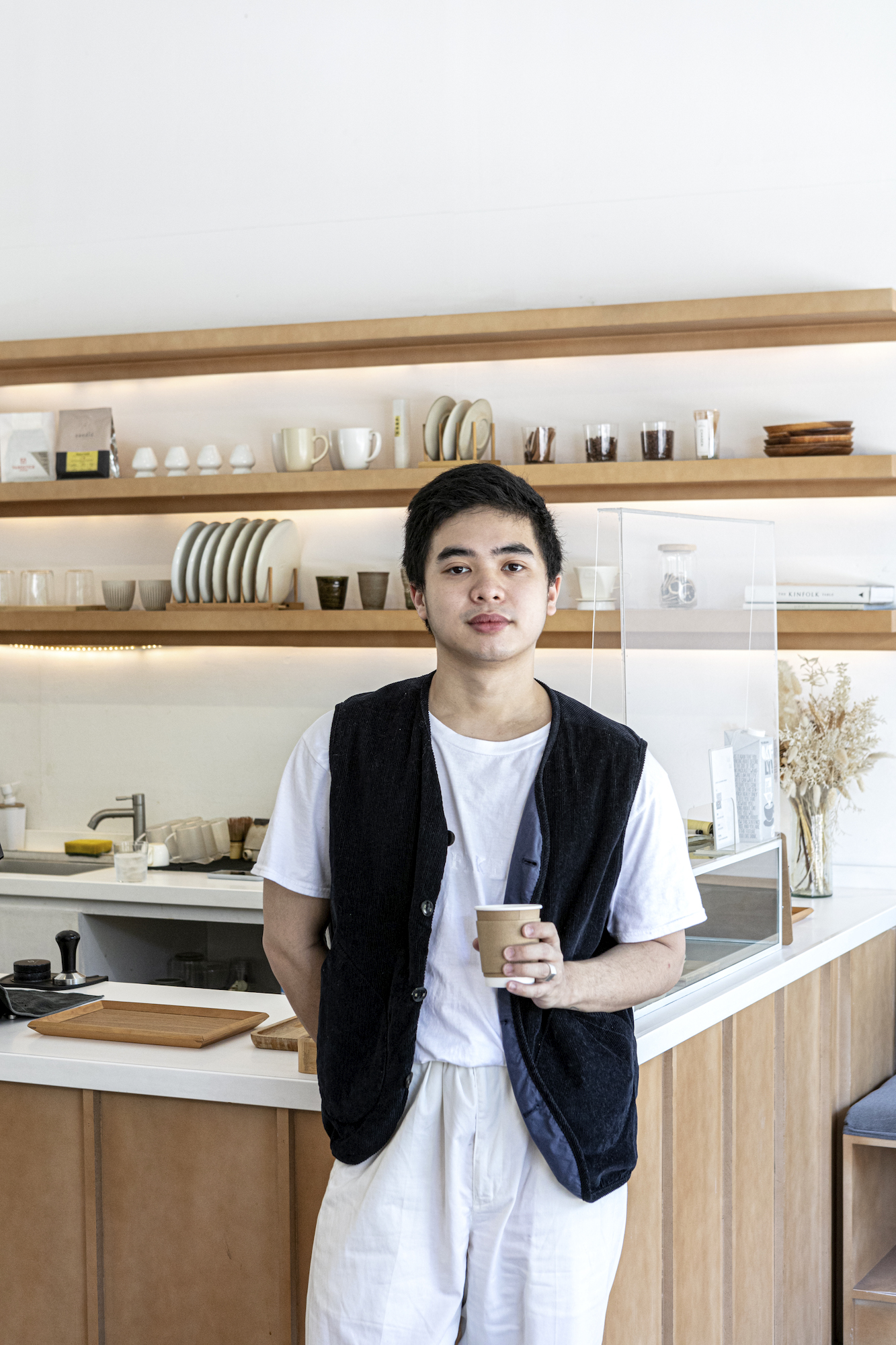 Twenty-five-year-old Niccolo Yabut is the brains behind Kalidad Coffee, a minimalist cafe in Angeles, Pampanga that serves specialty coffee