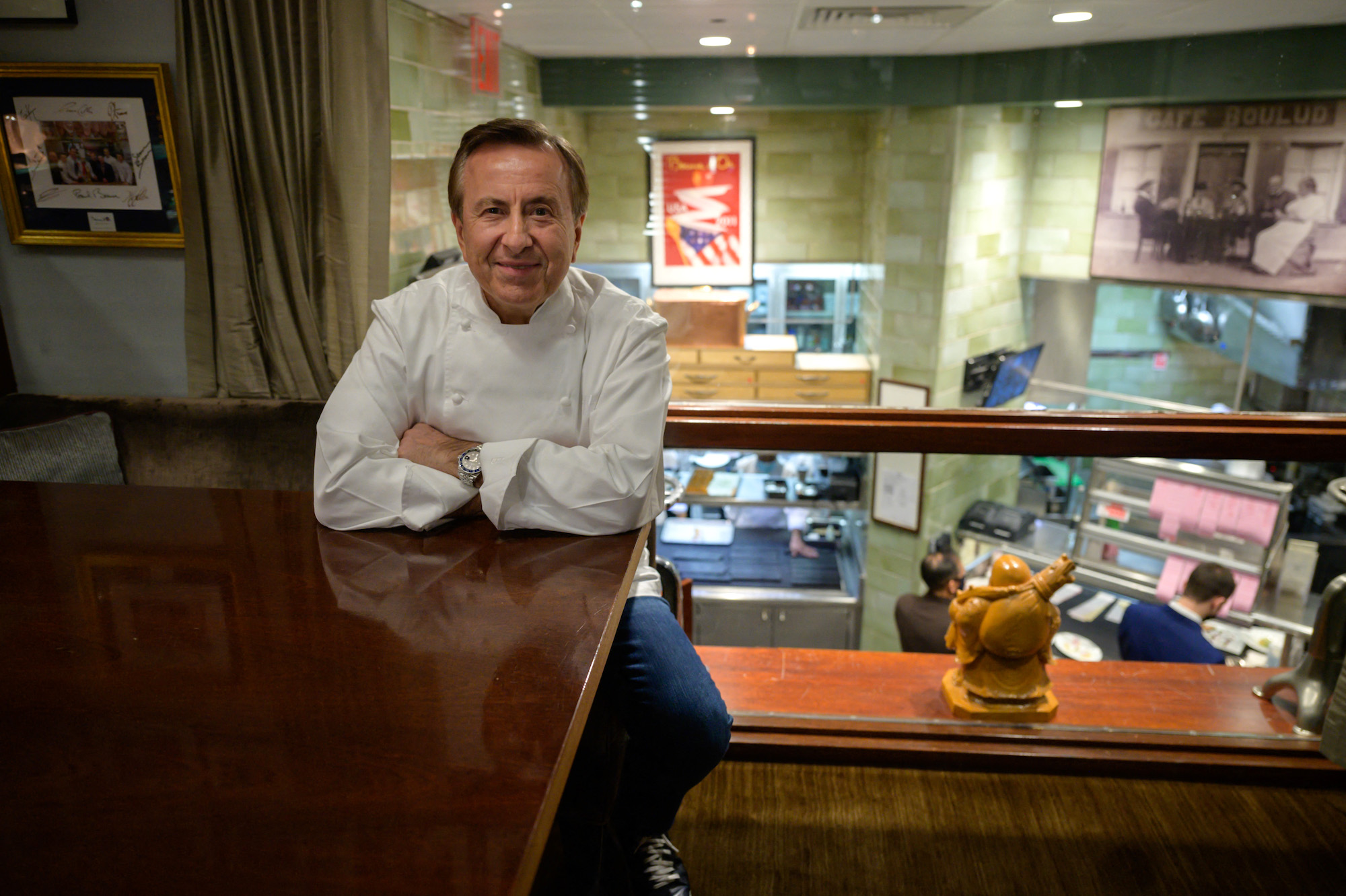 French chef and restaurateur Daniel Boulud poses for a photo in the office of his restaurant 'Daniel', in Manhattan, New York City on November 19, 2021