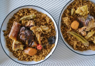 A picture shows thieboudiene plates, also known as Ceebu jÎn (literally "rice with fish" in wolof) in the Almadies area in Dakar, Senegal