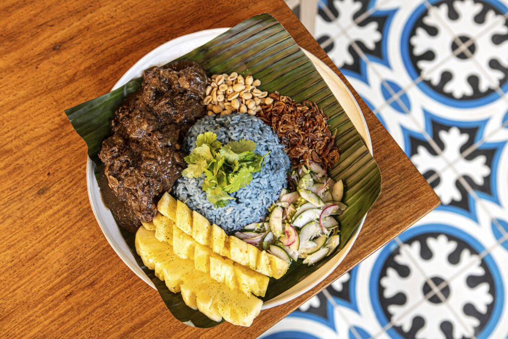 Peranakan lamb curry with blue pea coconut kaffir rice