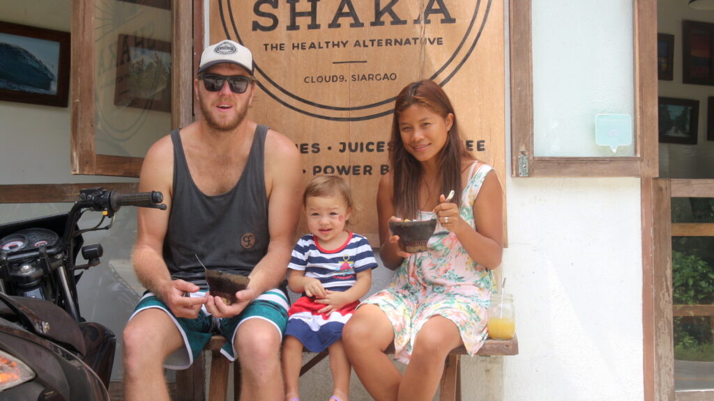 Ben Plummer of Shaka, seen here with his wife Lyn and their child, didn't just fall in love with the laid-back charm and beauty of Siargao