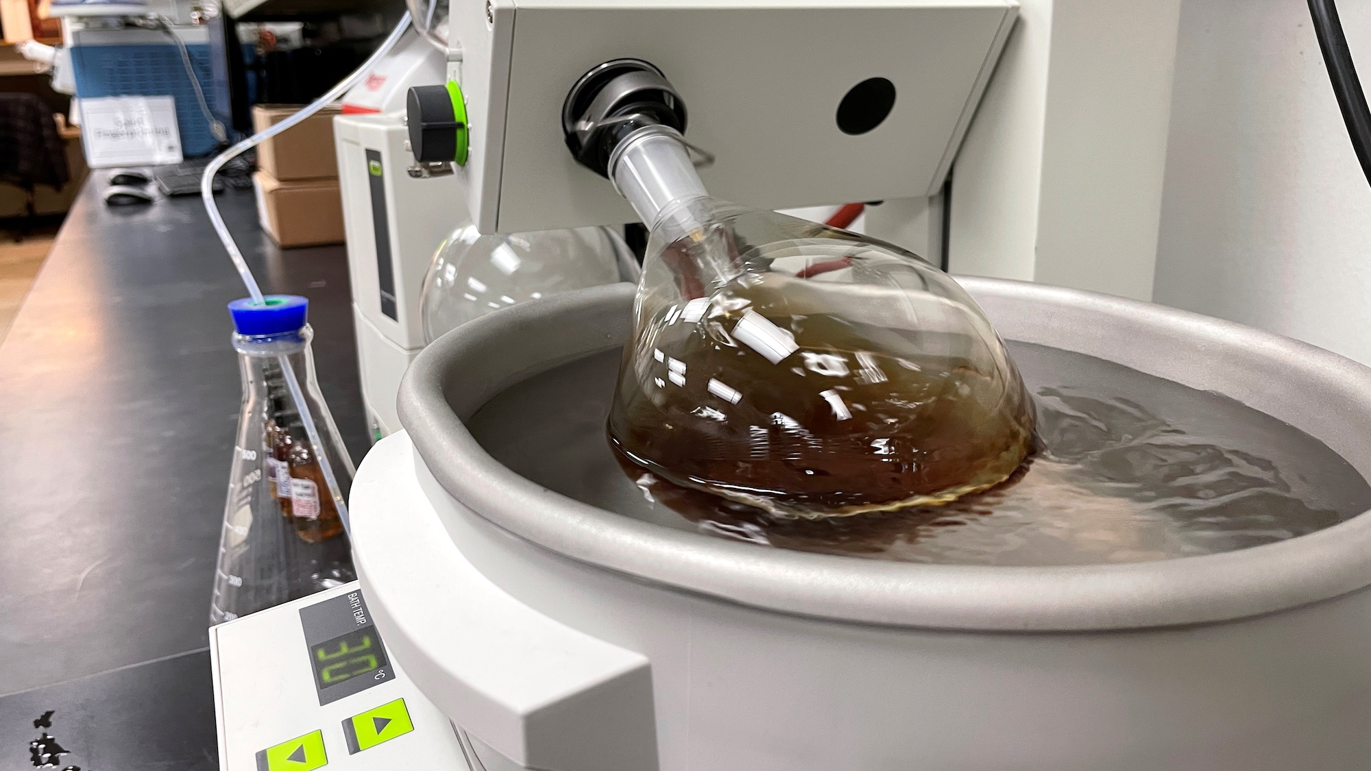 A whiskey sample made by Bespoken Spirits spins in a beaker during a process designed to remove chemical compounds from the liquid at the company's lab in Menlo Park, California