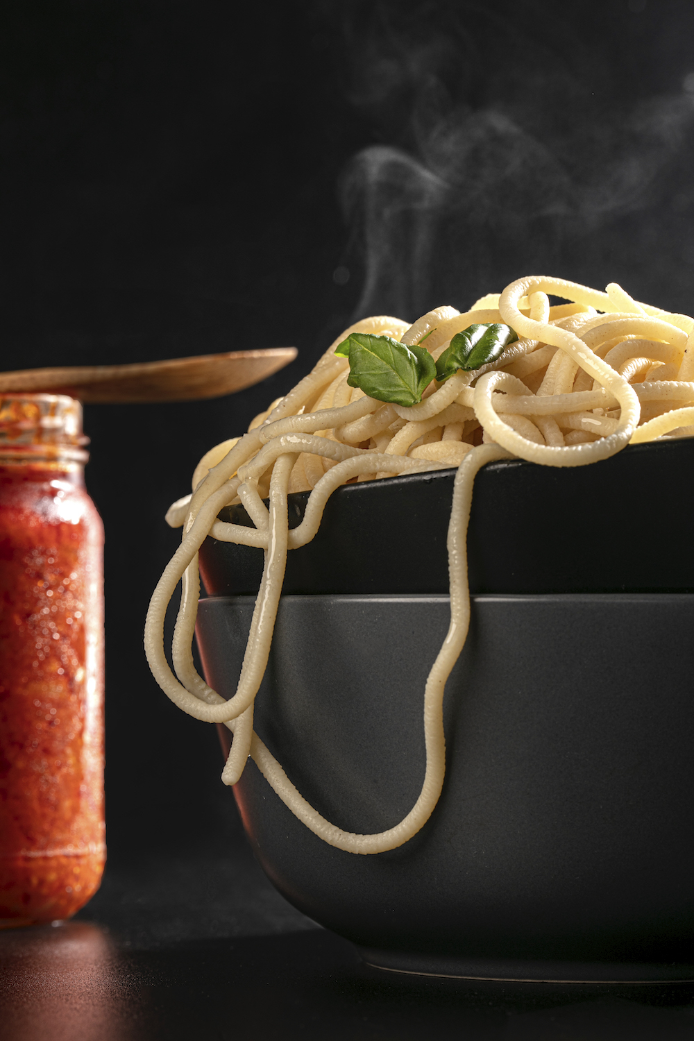 Because of brass dies in the machine, the texture of Conspire Foods spaghetti has scratches that allows it to hold on to more sauce