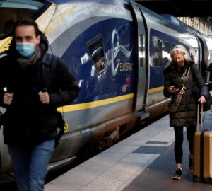 FILE PHOTO: Passengers arrive at the Eurostar terminal at Gare du Nord train station, after France eased travel restrictions for travelers from Britain amid the spread of the coronavirus disease (COVID-19) pandemic