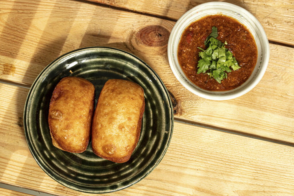 Fried homemade mantou with chili-crab dip
