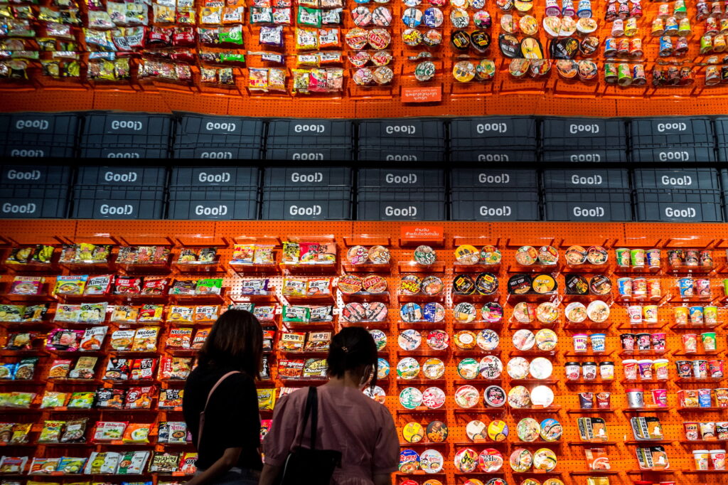 People browse instant noodles at the Good Noodle store