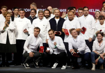 FILE PHOTO: Chefs celebrate on stage during the Michelin Guide 2022 award ceremony in Moscow, Russia