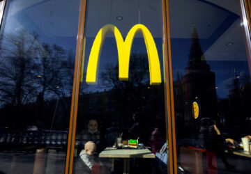 People have lunch at a McDonald's fast food restaurant in central Moscow on March 9, 2022