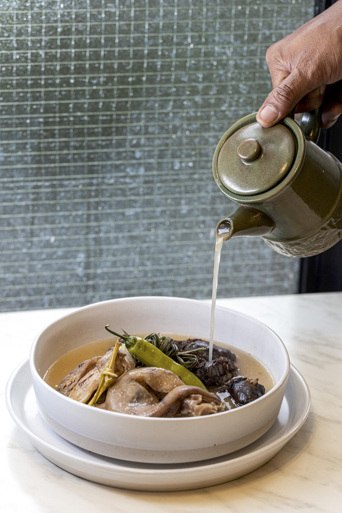Pata Y Negra: Pata pork in a thick savory broth served with dinuguan sausage