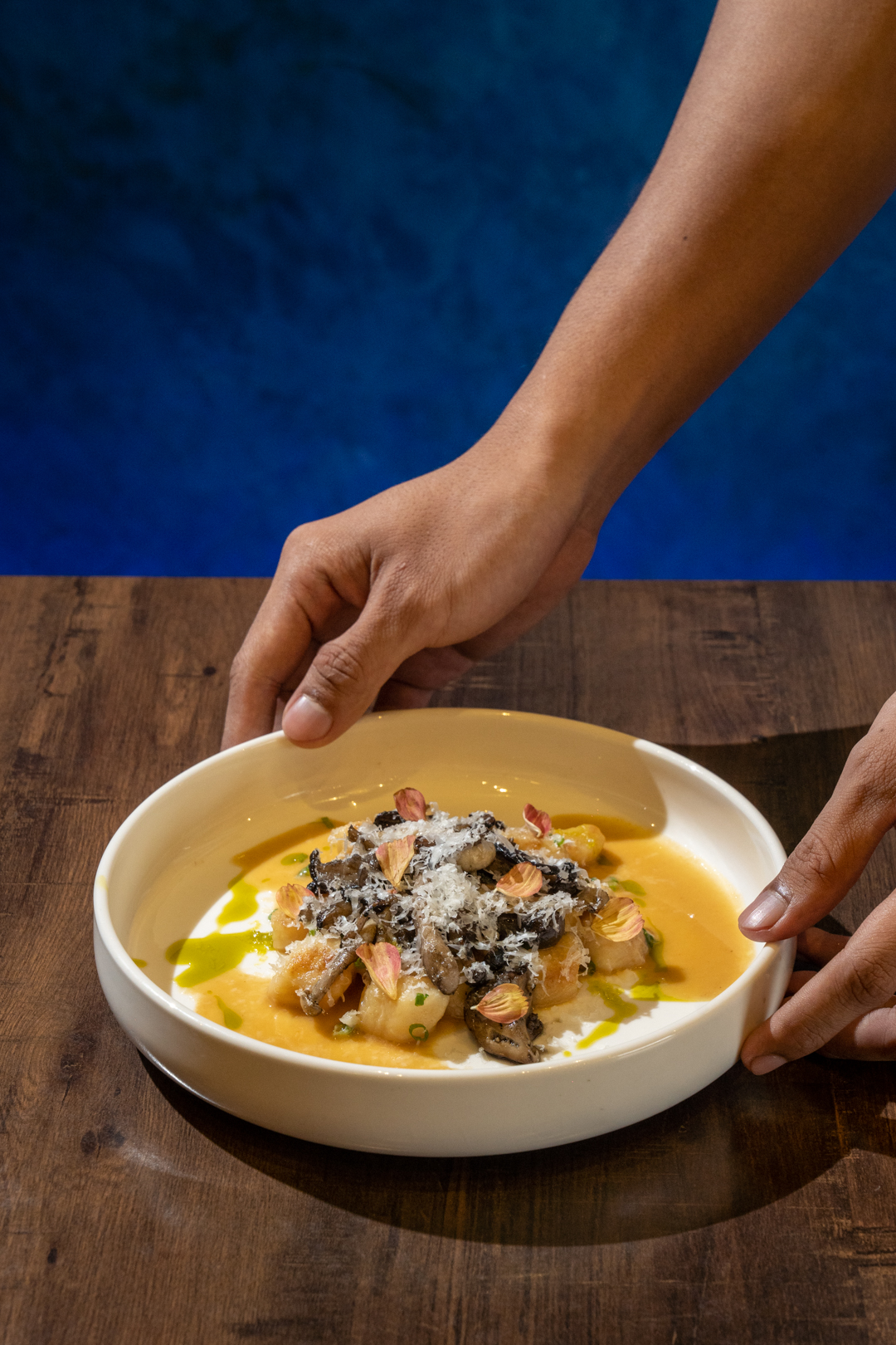 Ricotta gnocchi: Open fire mushrooms, 30-day fermented garlic miso, pecorino, and ohba leaves