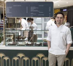 Ely Salar of Patisserie Le Choux-Colat in front of his physical store