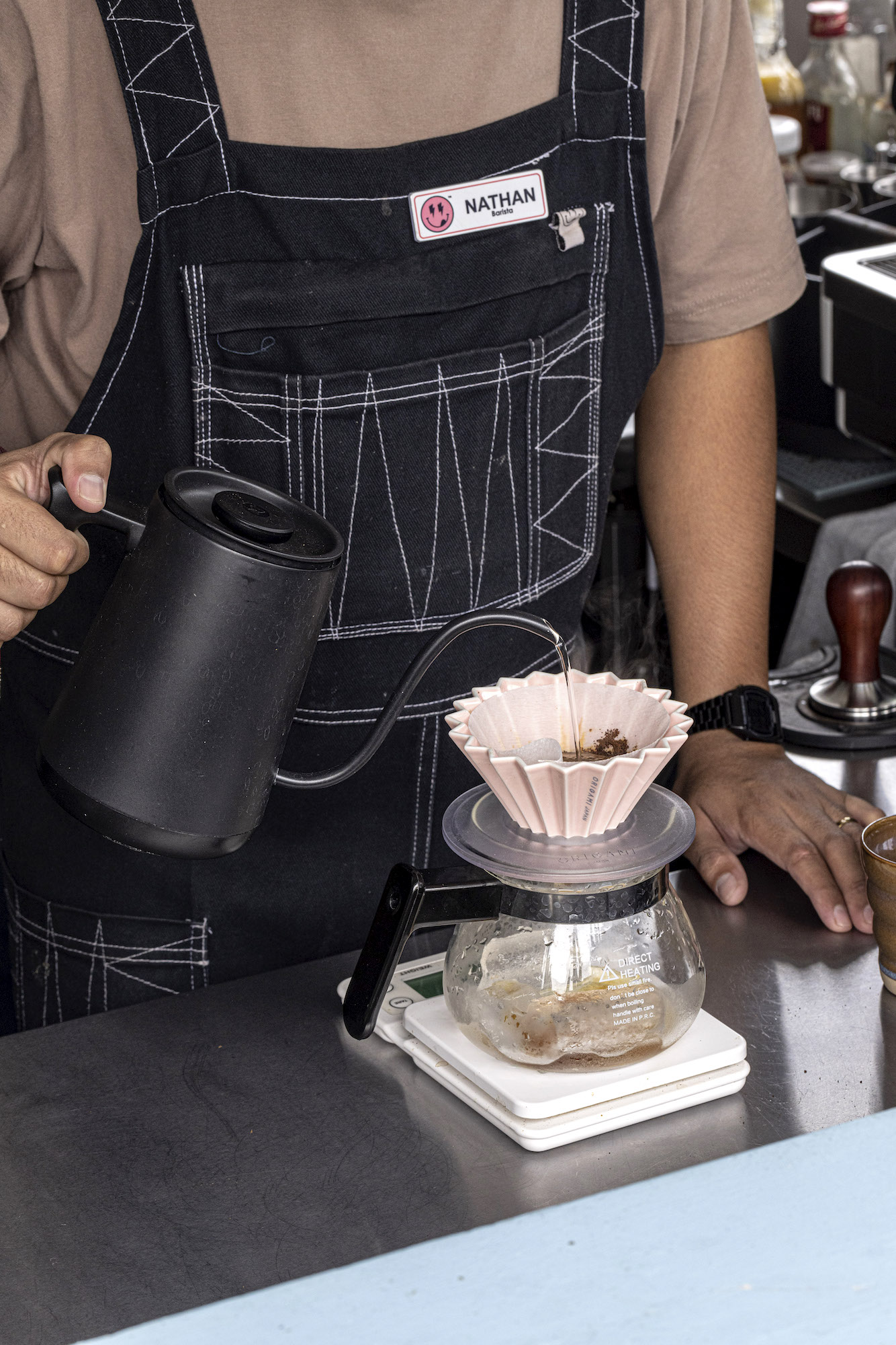 A closer look at their pour-over coffee process and chic aprons