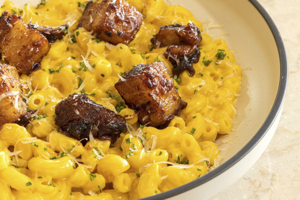 Mac N Cheese served with pork belly burnt ends
