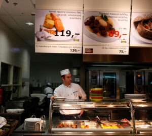 FILE PHOTO: A cook waits for customers at the Ikea cafeteria in Prague, February 25, 2013