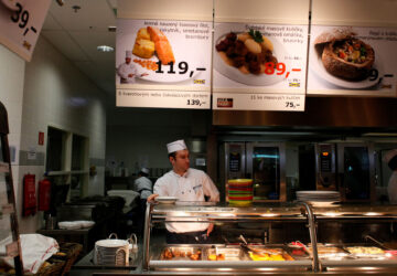 FILE PHOTO: A cook waits for customers at the Ikea cafeteria in Prague, February 25, 2013
