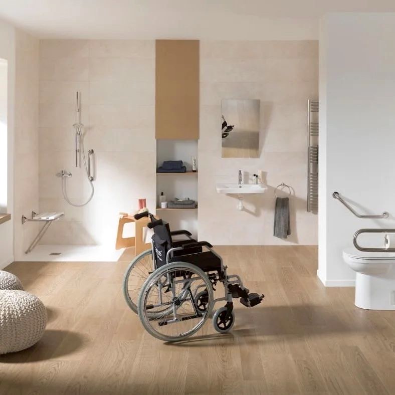 While not a restaurant bathroom, this image from Pro-Spar Bathroom Consultant details adaptations for the elderly and people with reduced mobility such as height consideration and rails and an unobstructed layout