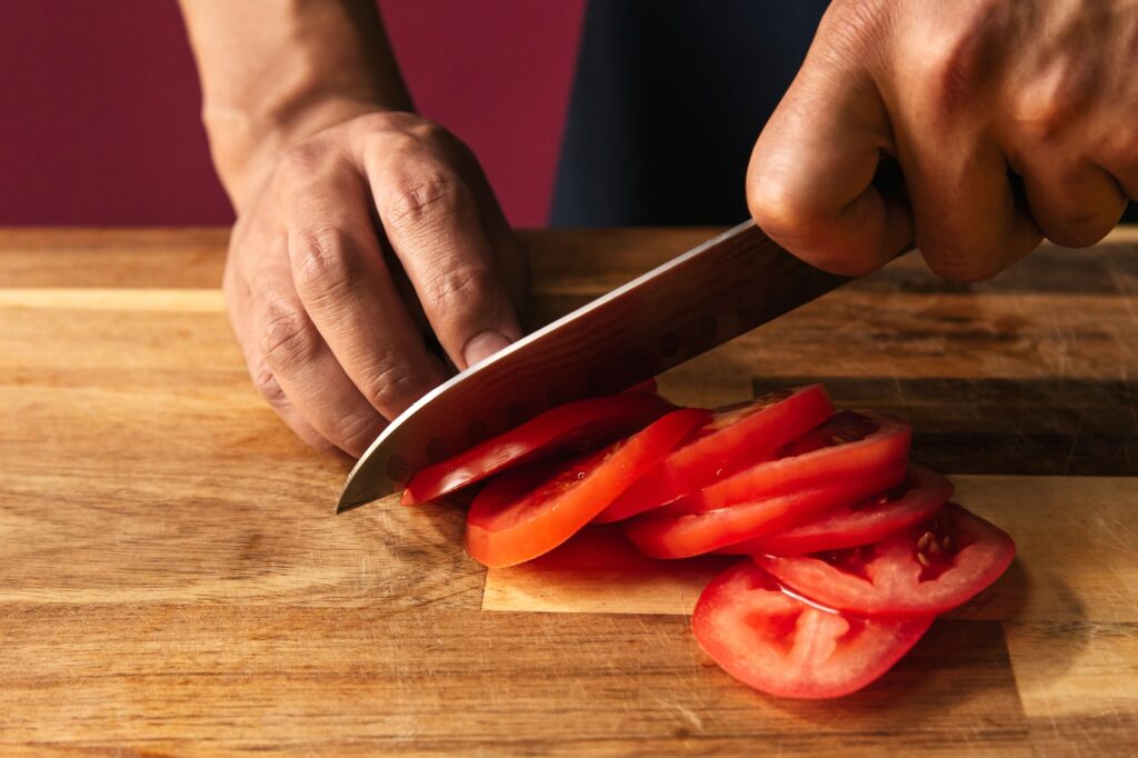 Chopping boards made of hardwood or even bamboo are more resistant to scarring from knives