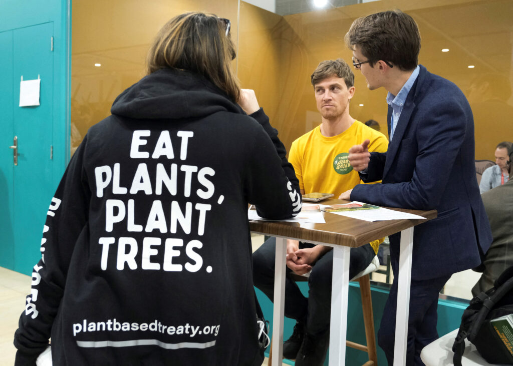 Joel Scott-Halkes, campaigns director at the RePlanet NGO and Max Weiss, The Plant Based Treaty global campaigner work at the COP27 climate summit