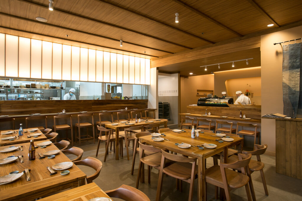The design goal of Yūgen Japanese Restaurant is to create an understated and intimate space that would allow guests to connect with nature