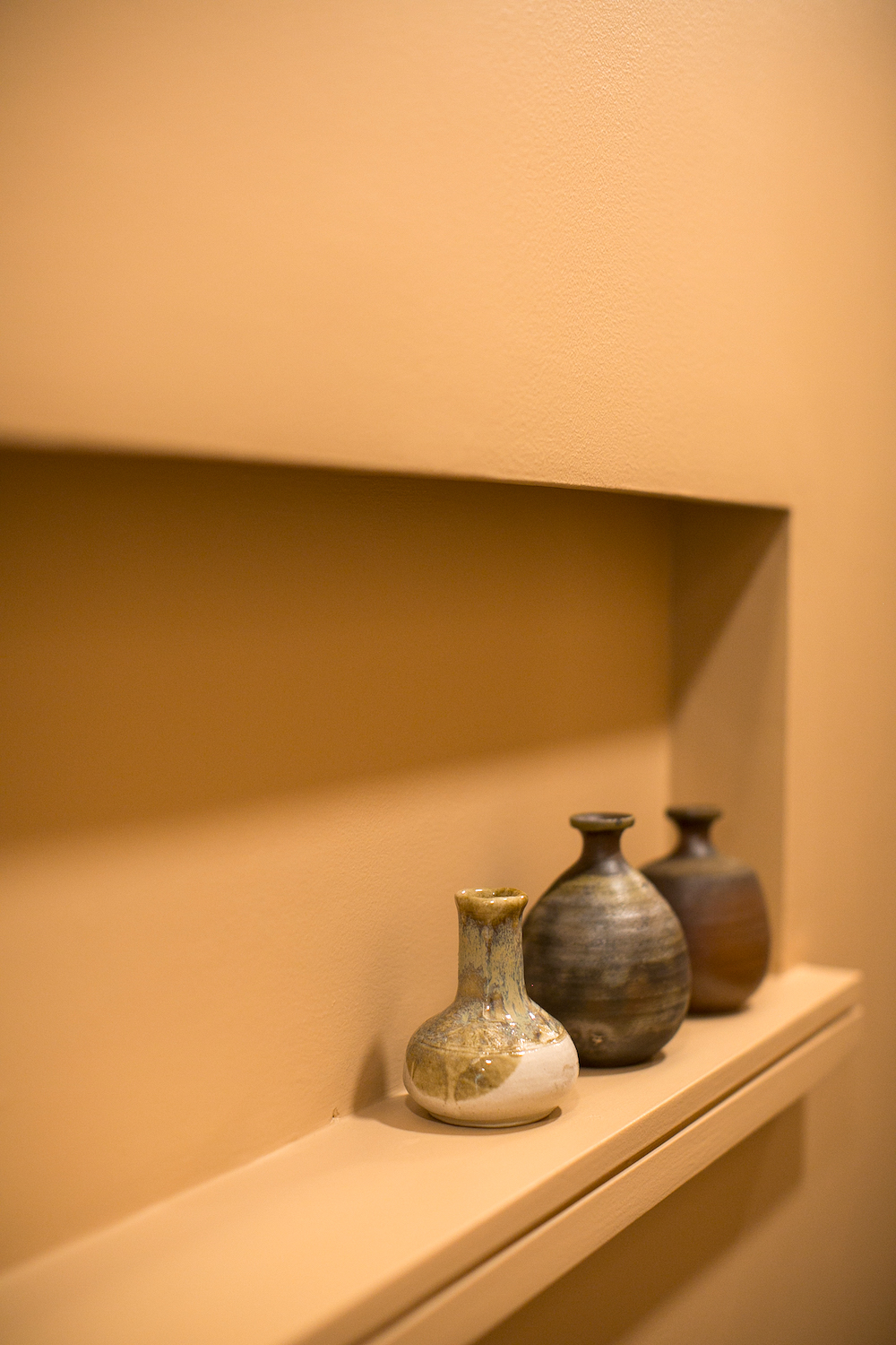 The space is quite a showcase for design details such as pottery from Cornerstone Pottery