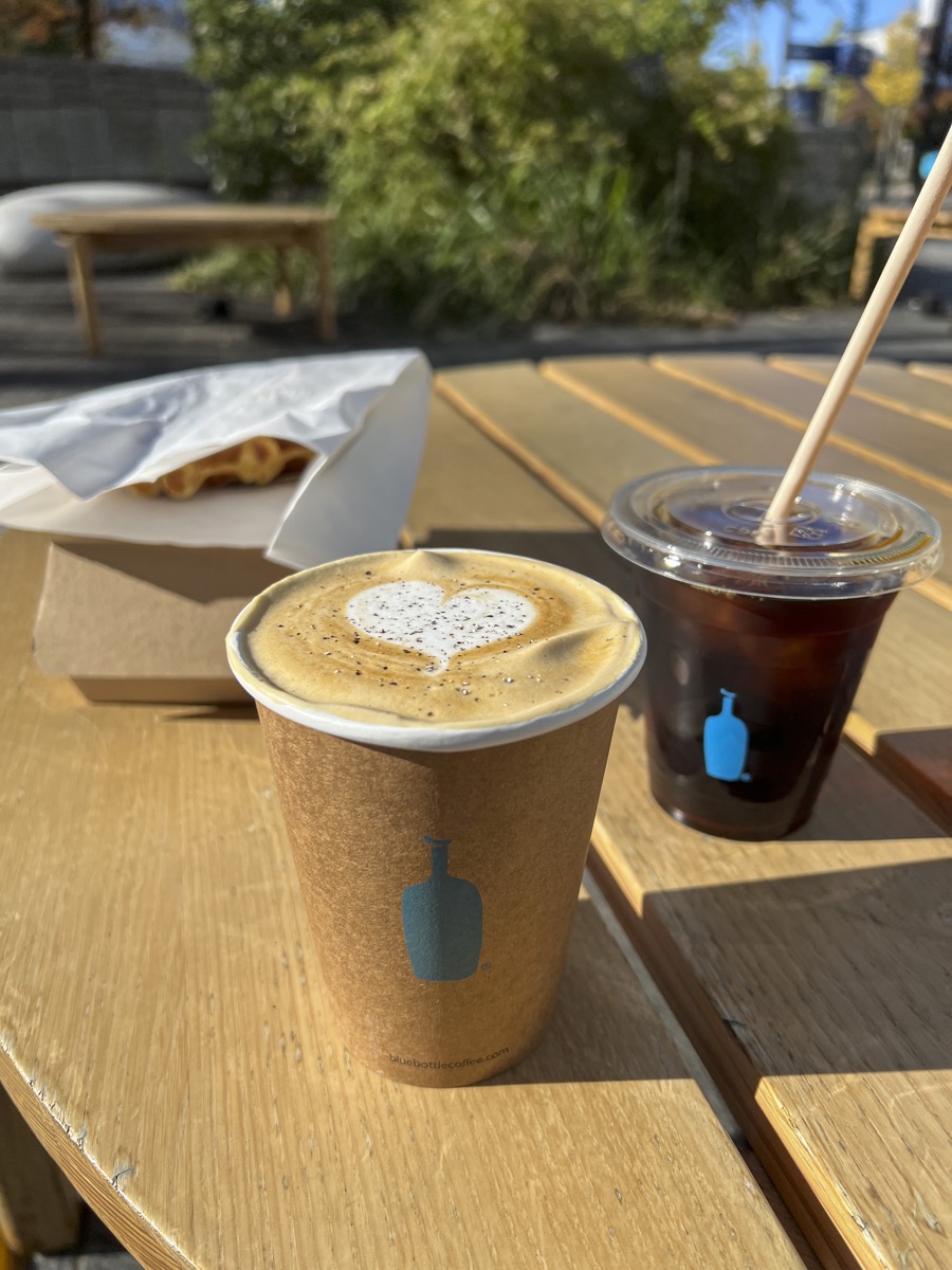 Blue Bottle's cardamom latte and a cold brew