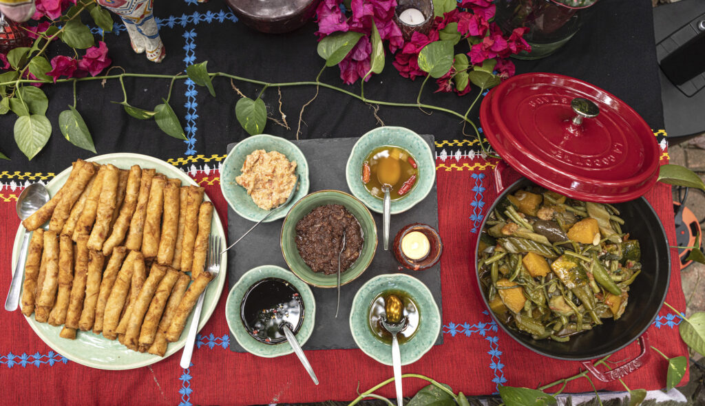A dreamy spread of lumpia, pinakbet, buro, and various dips and sauces