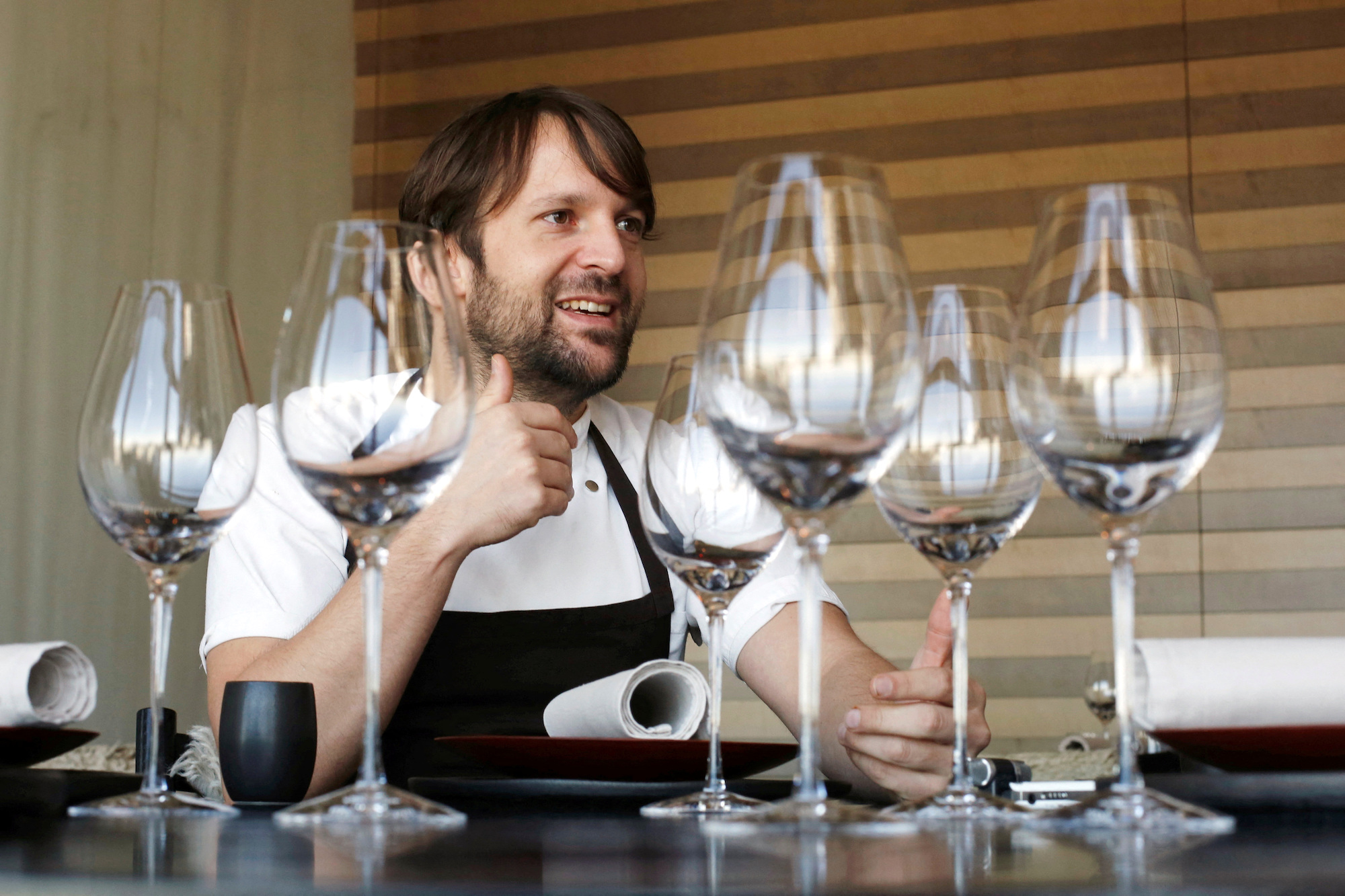 FILE PHOTO: Rene Redzepi, the head chef of Noma in Copenhagen, talks during an interview with Reuters at Noma at Mandarin Oriental Tokyo February 10, 2015