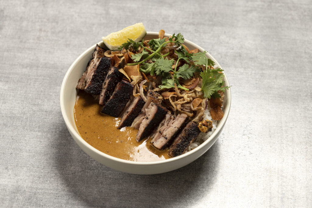Penang beef curry: Penang curry sauce, 48 hours beef belly, white rice, lime, spiced peanuts, cilantro