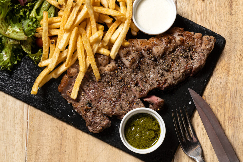 A Pablo Bistro recommendation is this striploin with house fries and side salad