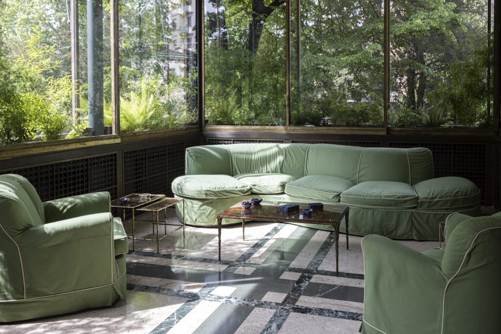 The veranda inside Villa Necchi has a winter garden encased in between two panes of glass
