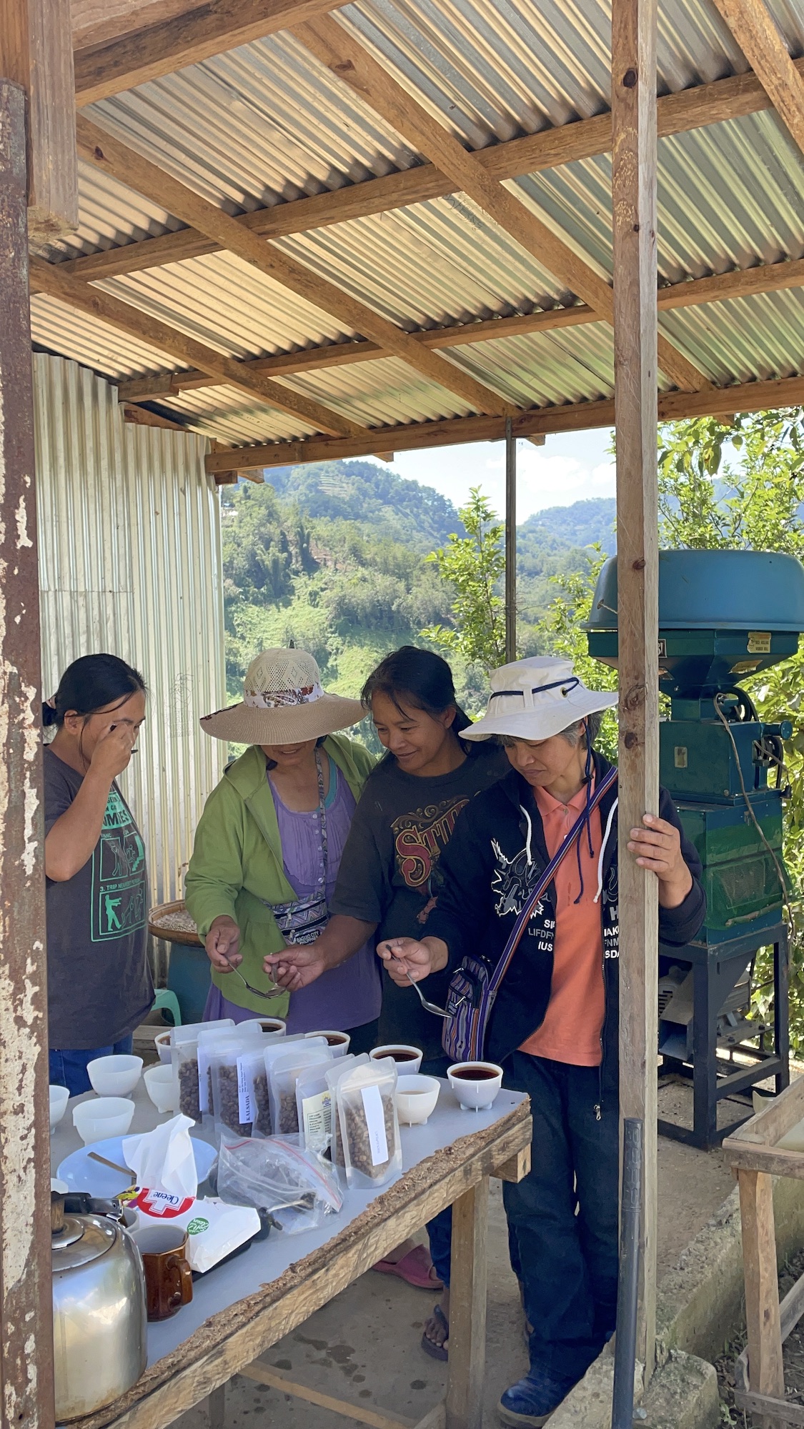 The aunties of Sitio Kisbong, also of Atok, hold a cupping session of their harvest