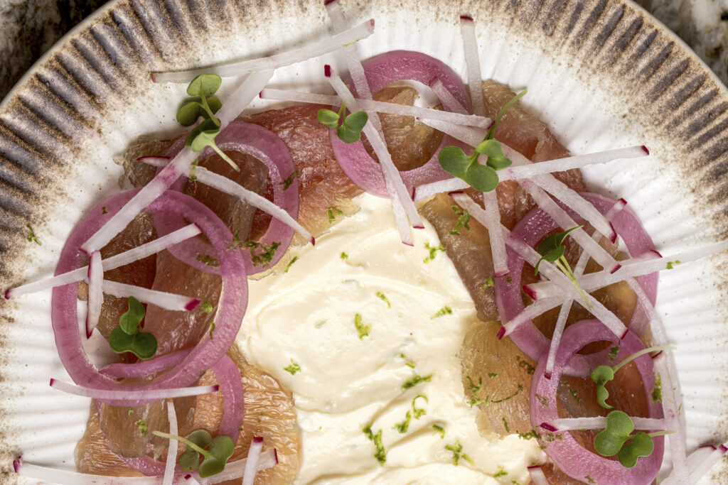 Tuna crudo (cured tuna with lime cream and pickled onions)
