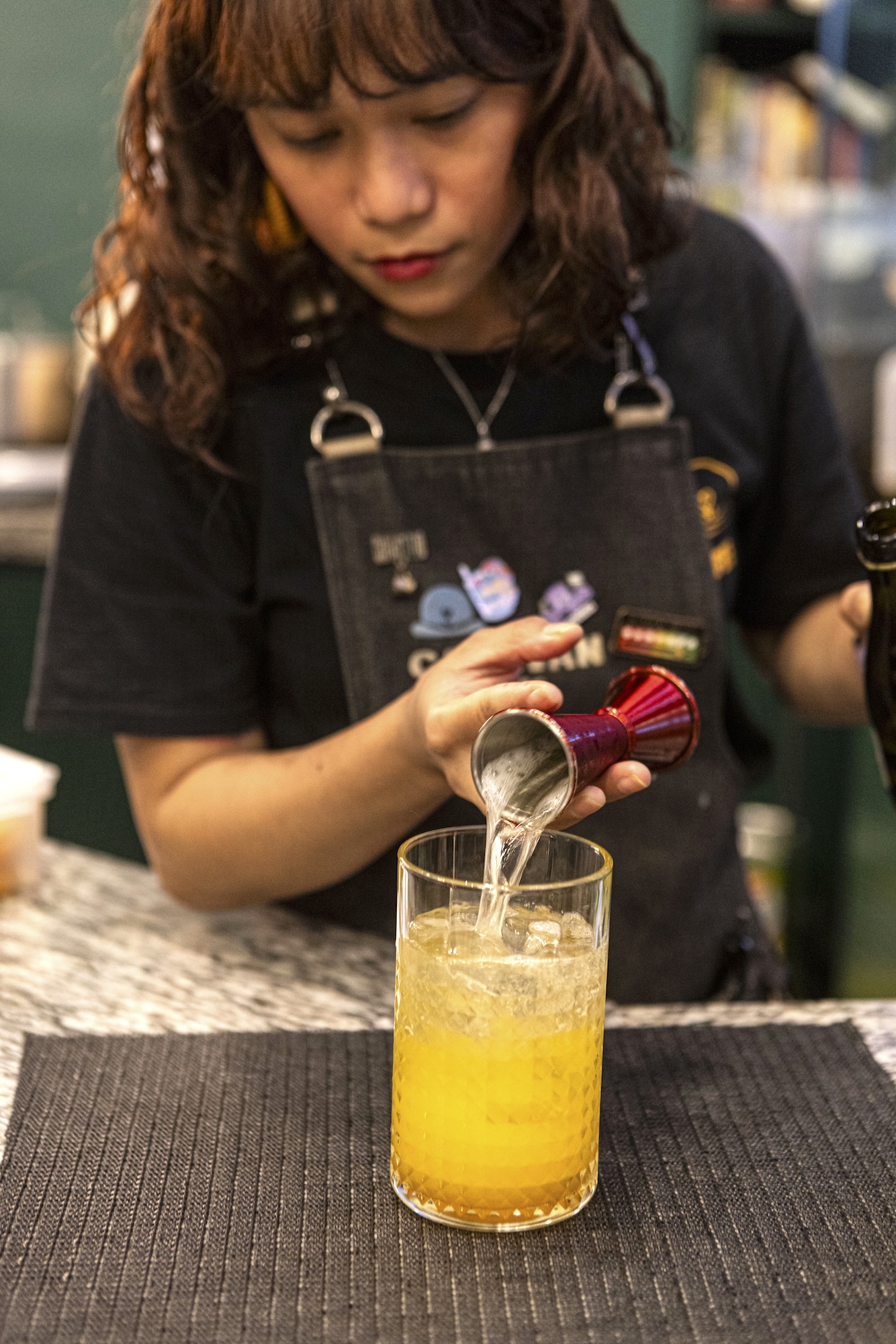The Garden Sangria is prepared with a mix of orange and tangerine syrup with a dose of Tanqueray Seville and Cointreau