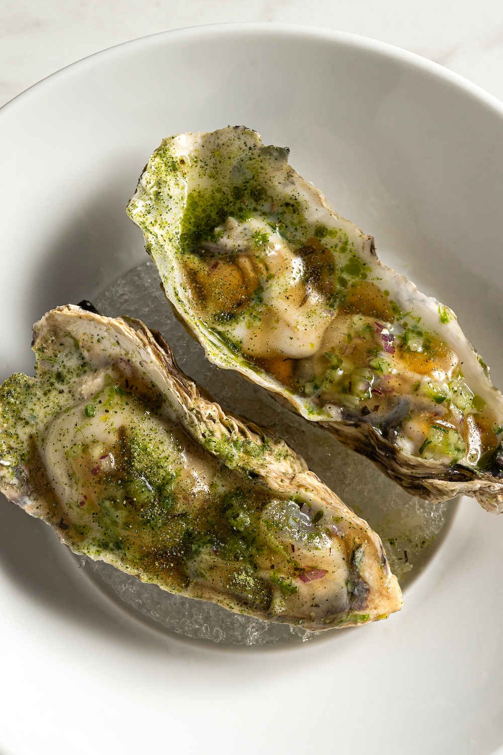 Japanese shin honda oyster with ponzu and coconut foam 