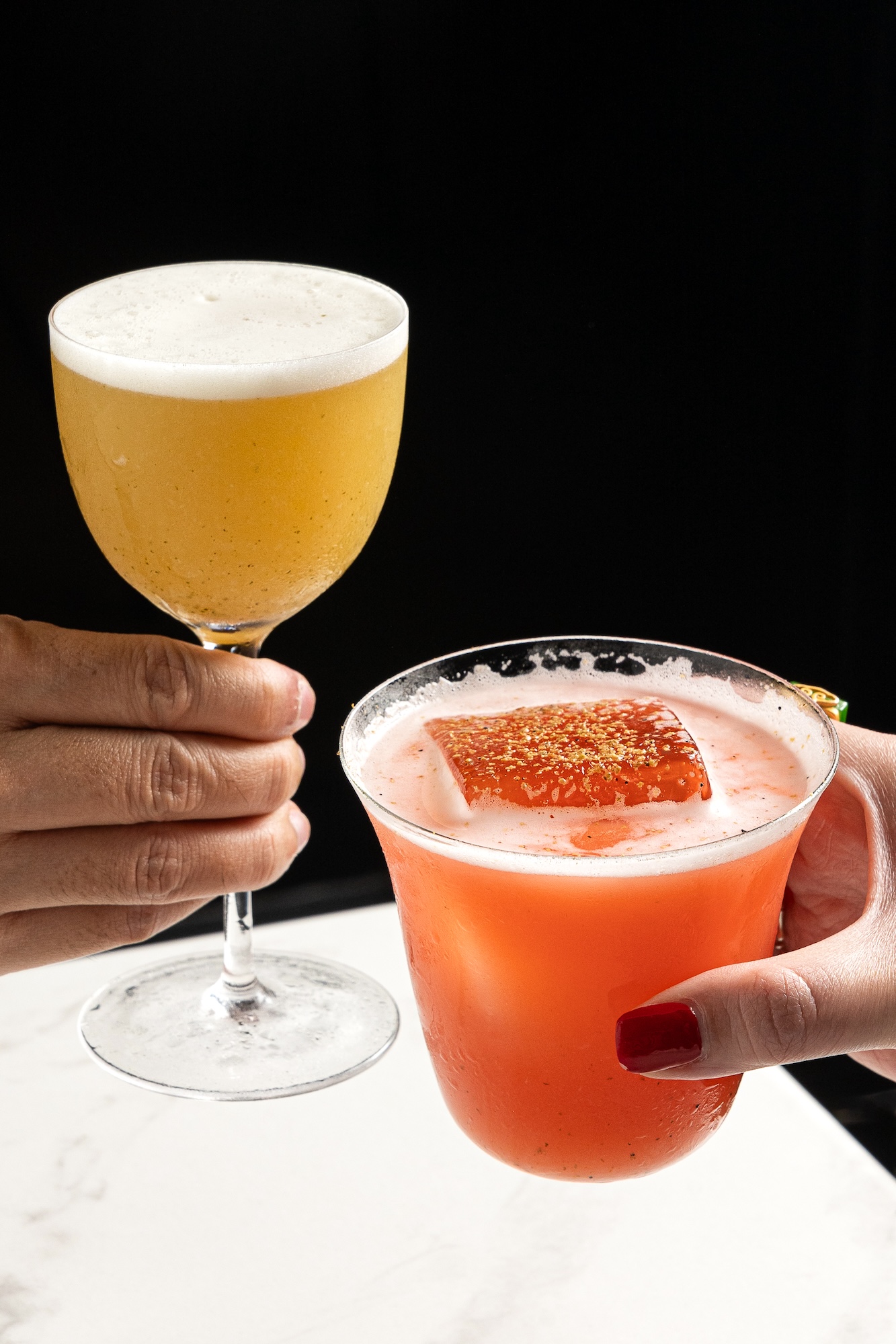 Two of Aurora’s signature cocktails: Curry Up and Pretty Pink