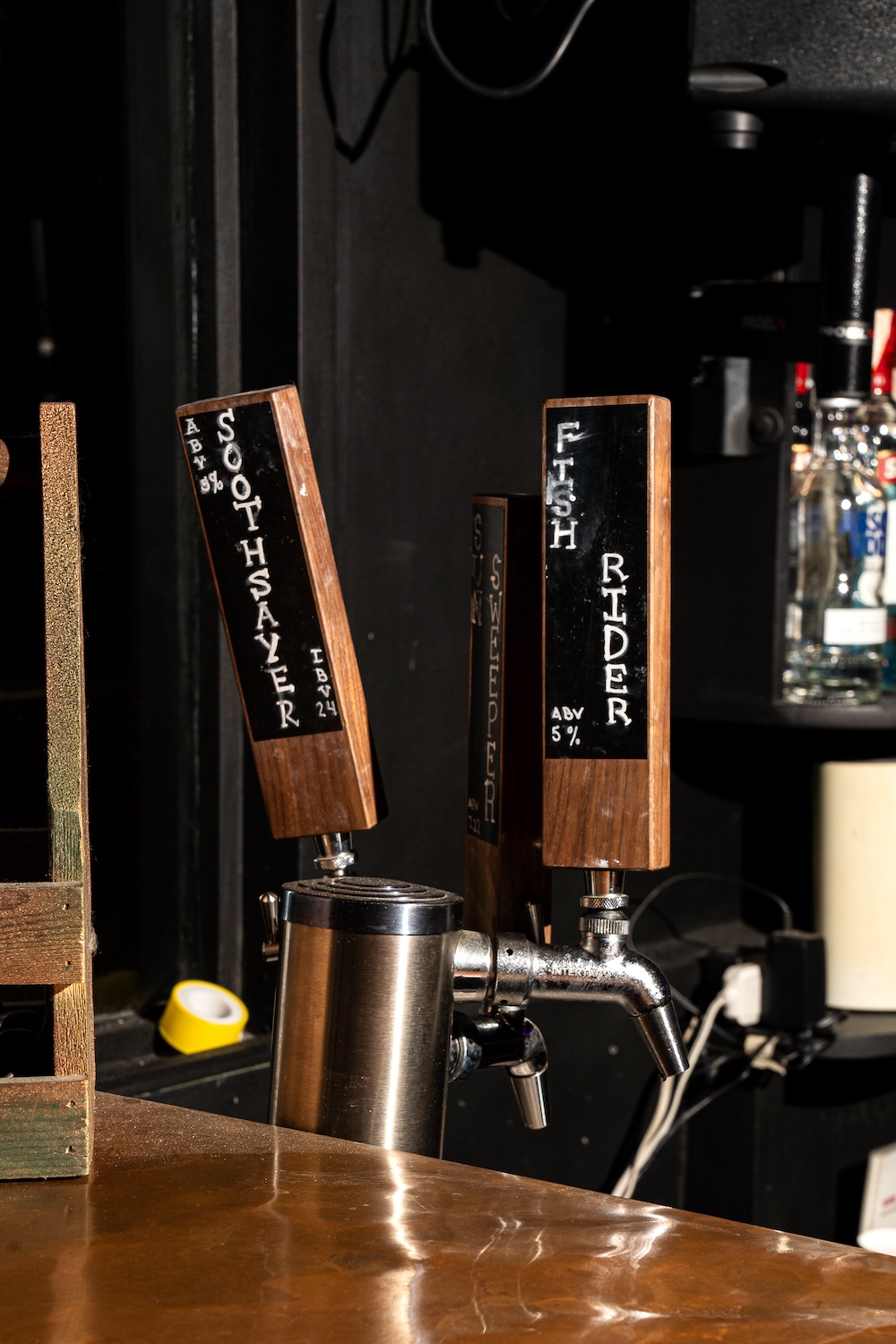 Key elements of Nolita Joe's bar—beer taps